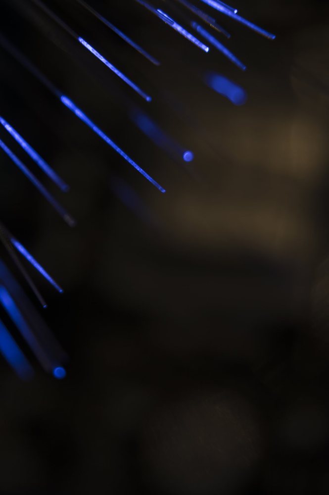 Strands of optical fibre carrying light